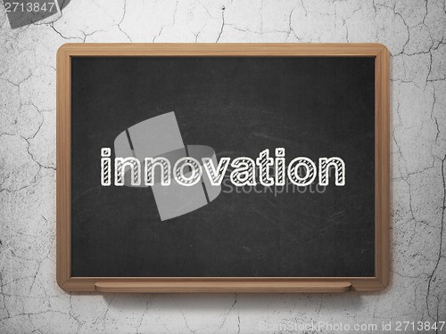 Image of Business concept: Innovation on chalkboard background