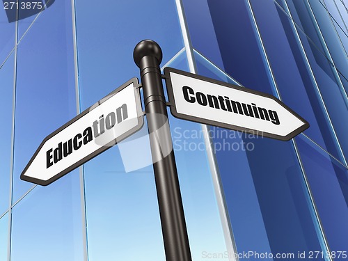 Image of Education concept: sign Continuing Education on Building background