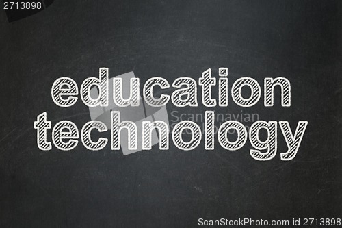 Image of Education concept: Education Technology on chalkboard background