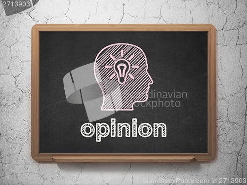 Image of Advertising concept: Head With Light Bulb and Opinion on chalkboard background