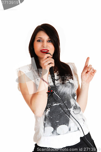 Image of Portrait of girl singing.
