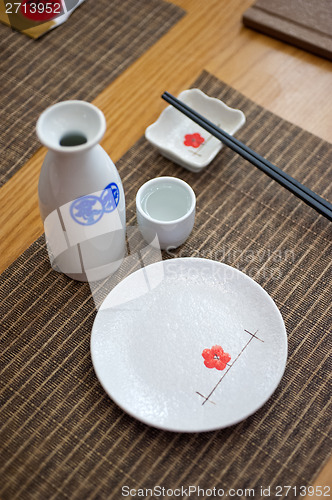 Image of Japanese style table set and sake