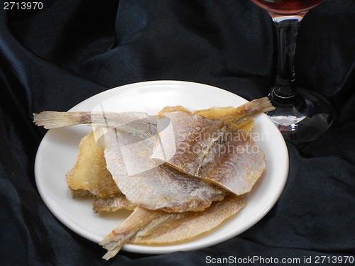 Image of Sea bream fish on a white plate