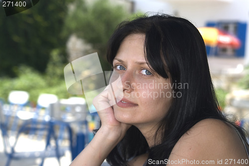 Image of pretty woman at greek island cafe