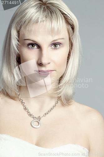 Image of studio portrait of beautiful woman