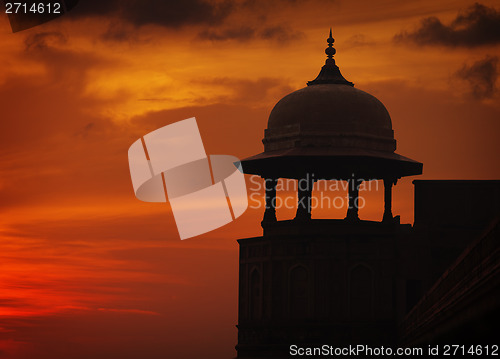 Image of Silhouette of tower on sunset sky background, Red ford, Agra, In