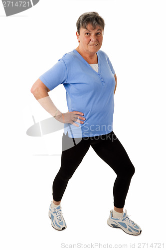 Image of Senior woman doing stetching exercises