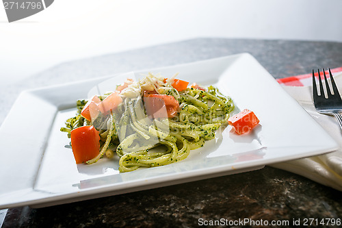 Image of Fettucini pasta with pesto sauce