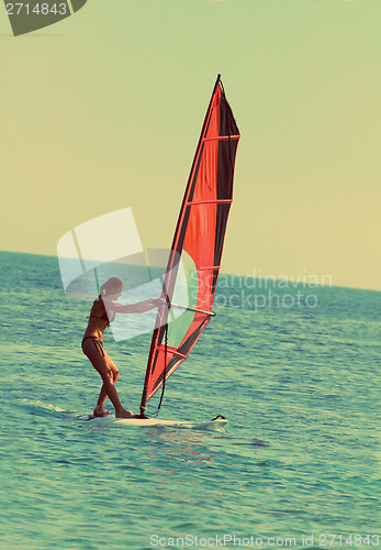 Image of windsurfing - vintage retro style