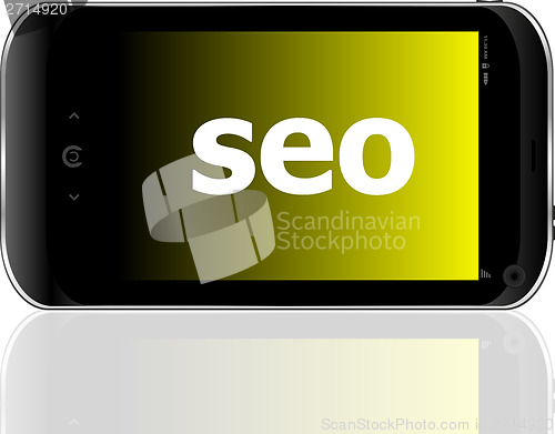 Image of Web development concept: smartphone with word SEO on display