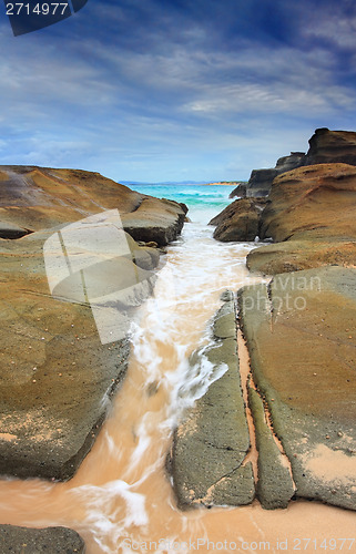 Image of Steadfast,  Sea wash through rock crevice