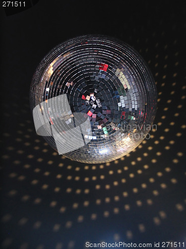 Image of The mirror sphere hanging in a night club. The bottom view.
