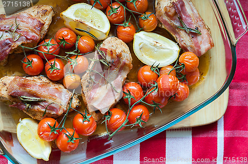 Image of Vegetables and chicken in pan baked in oven