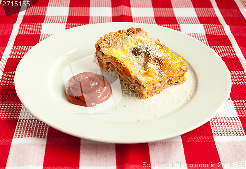 Image of Portion of tasty lasagna on a plate 