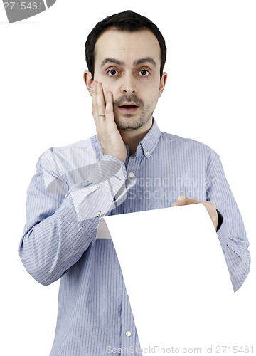 Image of Man holding a paper