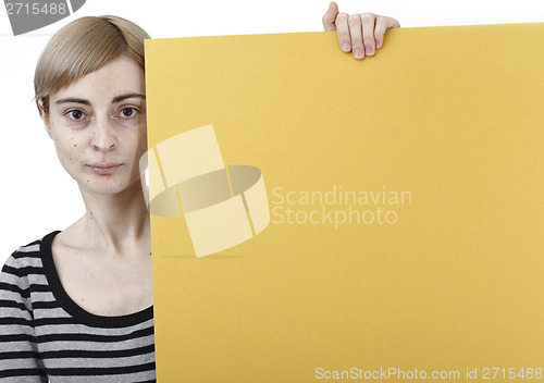 Image of Woman holding a paper