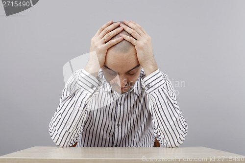 Image of Man at desk