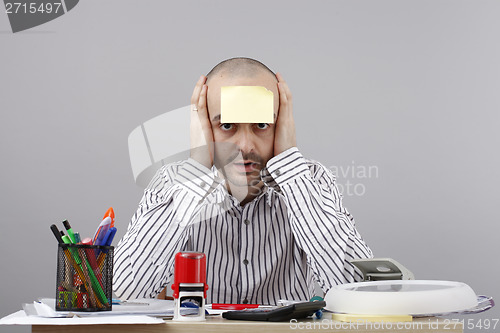 Image of Man at desk