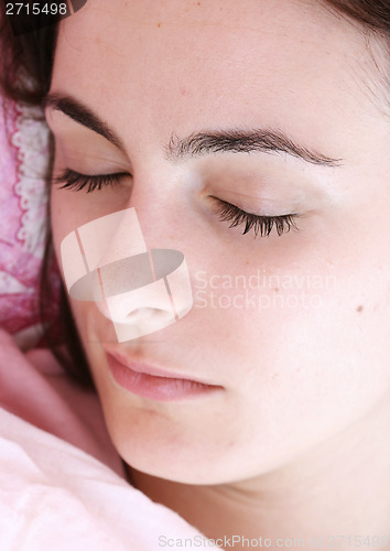 Image of Beautiful young woman sleeping.