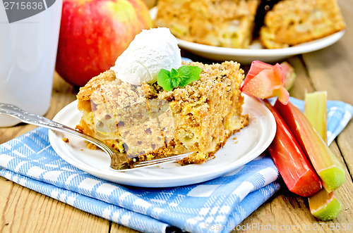 Image of Pie with ice cream and rhubarb on board