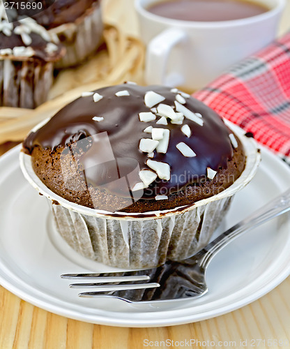 Image of Cupcake chocolate with a red napkin