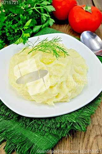 Image of Potatoes mashed  with butter on board