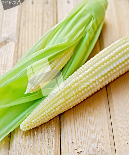 Image of Corncobs peeled on the board