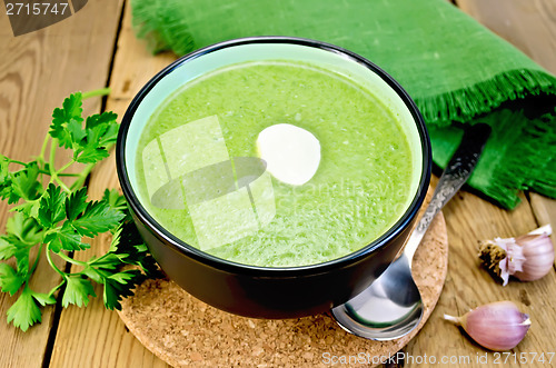 Image of Puree from spinach with garlic on board