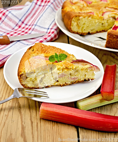 Image of Pie with rhubarb and fork on chalkboard