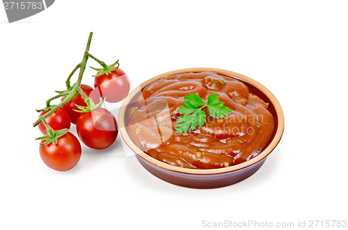 Image of Ketchup in pottery with tomatoes