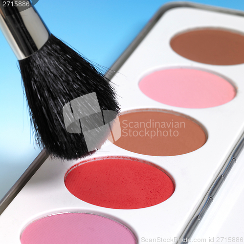 Image of make-up colors and brush