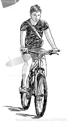 Image of boy riding a cycle