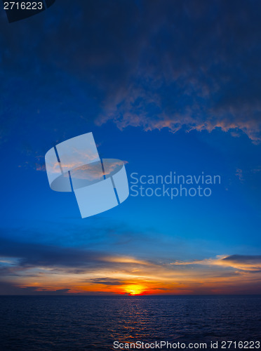 Image of Dark colored sky at dusk - vertical seascape