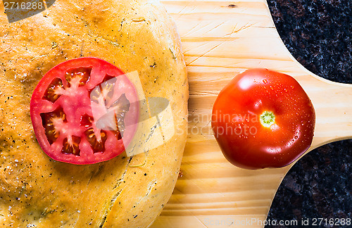 Image of Loaf of Focaccia bread with tomatoes.