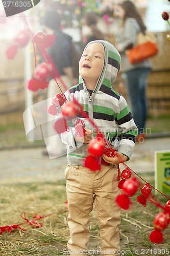 Image of Little Boy With Easter Eggs