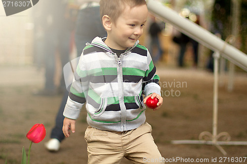 Image of Little Boy With Easter Eggs