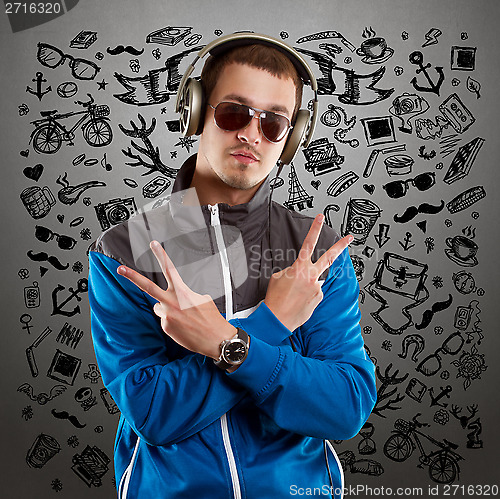 Image of Man in Glasses With Headphones
