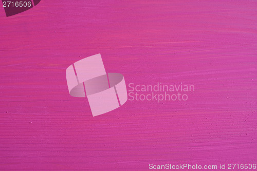 Image of Pine board painted pink, visible wood grain
