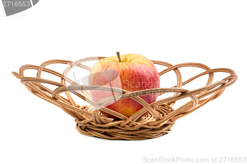 Image of Sweet red apple in wicker