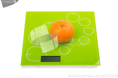 Image of Sweet mandarin on scales