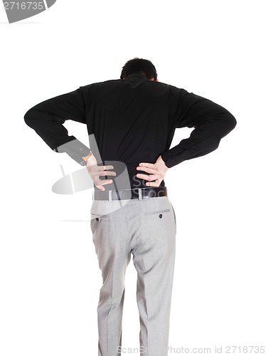 Image of Man with heavy back pain.