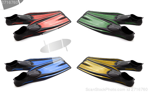 Image of Set of multicolored swim fins on white background