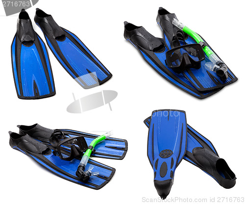 Image of Set of blue flippers, mask, snorkel for diving with water drops