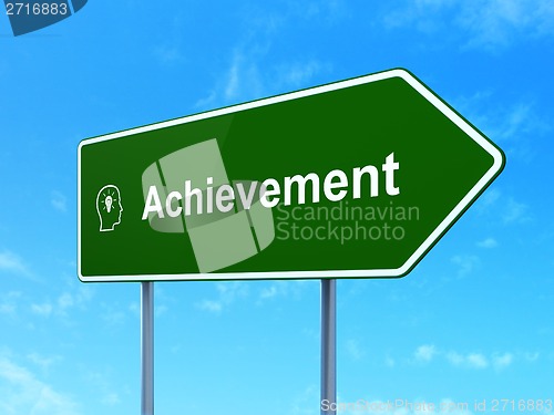 Image of Education concept: Achievement and Head With Lightbulb on road sign background