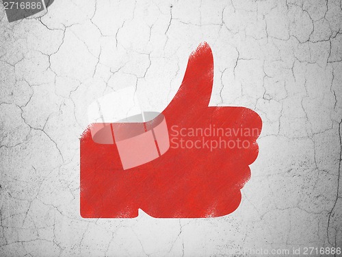 Image of Social network concept: Thumb Up on wall background