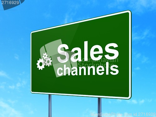 Image of Advertising concept: Sales Channels and Gears on road sign background