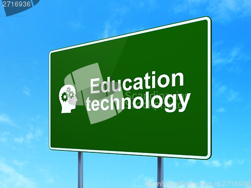Image of Education concept: Education Technology and Head With Gears on road sign background