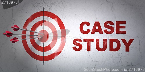 Image of Education concept: target and Case Study on wall background