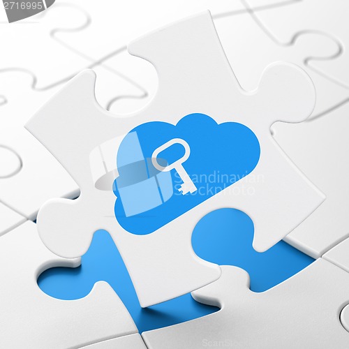 Image of Cloud networking concept: Cloud With Key on puzzle background