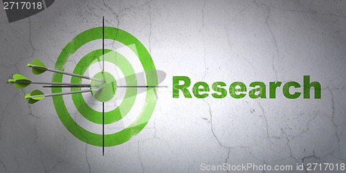 Image of Advertising concept: target and Research on wall background